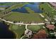 Aerial view of golf course and residential homes at 10792 Tarflower Dr # 202, Venice, FL 34293
