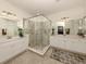 Elegant bathroom with double vanity and large shower at 10792 Tarflower Dr # 202, Venice, FL 34293