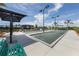 Bocce ball courts with green surface and seating at 10792 Tarflower Dr # 202, Venice, FL 34293