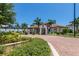 Community center with inviting entrance and landscaping at 10792 Tarflower Dr # 202, Venice, FL 34293