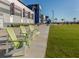 Green Adirondack chairs in front of Braves building at 10792 Tarflower Dr # 202, Venice, FL 34293