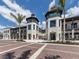 Upscale shops with brick street and palm trees at 10792 Tarflower Dr # 202, Venice, FL 34293