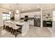 Modern kitchen with white cabinets, quartz countertops, and stainless steel appliances at 10792 Tarflower Dr # 202, Venice, FL 34293