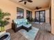 Spacious lanai with outdoor seating at 10792 Tarflower Dr # 202, Venice, FL 34293