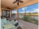 Relaxing lanai overlooking a lake and golf course at 10792 Tarflower Dr # 202, Venice, FL 34293