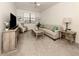 Cozy living room with sofa and neutral decor at 10792 Tarflower Dr # 202, Venice, FL 34293
