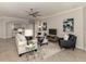 Bright living room featuring comfortable seating and stylish decor at 10792 Tarflower Dr # 202, Venice, FL 34293