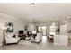 Open concept living area with kitchen and golf course view at 10792 Tarflower Dr # 202, Venice, FL 34293