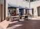 Striped awnings over outdoor seating area near shops at 10792 Tarflower Dr # 202, Venice, FL 34293