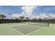 Two pickleball courts with net and fencing at 10792 Tarflower Dr # 202, Venice, FL 34293