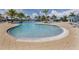 Relaxing freeform pool with plenty of lounge space at 10792 Tarflower Dr # 202, Venice, FL 34293