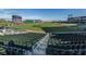Green stadium seats with view of baseball field at 10792 Tarflower Dr # 202, Venice, FL 34293