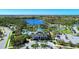 Aerial view of community amenities including pool and clubhouse at 11409 Okaloosa Dr, Venice, FL 34293