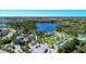 Community features a lake, pool, playground, and parking at 11409 Okaloosa Dr, Venice, FL 34293