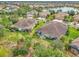Aerial view of homes with backyard lanai at 11409 Okaloosa Dr, Venice, FL 34293