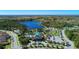 Resort-style community with pool, lake, playground, and tennis courts at 11409 Okaloosa Dr, Venice, FL 34293