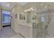 Bathroom with single vanity and walk-in shower at 11409 Okaloosa Dr, Venice, FL 34293