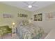 Charming bedroom with a queen bed and coastal theme at 11409 Okaloosa Dr, Venice, FL 34293