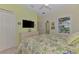 Bedroom with queen bed and coastal decor at 11409 Okaloosa Dr, Venice, FL 34293