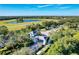 Community entrance with lush landscaping at 11409 Okaloosa Dr, Venice, FL 34293