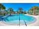 Resort-style pool with a waterslide and plenty of lounge space at 11409 Okaloosa Dr, Venice, FL 34293