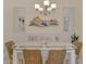 Coastal-themed dining room with glass-top table and built-in bench at 11409 Okaloosa Dr, Venice, FL 34293