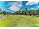 Fenced dog park with agility equipment and shaded seating at 11409 Okaloosa Dr, Venice, FL 34293