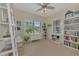 Bright home office features built-in shelving, window seating, and ample natural light at 11409 Okaloosa Dr, Venice, FL 34293