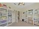 Spacious home office with ample storage, and a view into another room at 11409 Okaloosa Dr, Venice, FL 34293