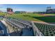 View of a baseball stadium's seating area with tables and chairs at 11945 Lovegrass St, Venice, FL 34293