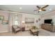 Bright and airy community room with comfortable seating area at 11945 Lovegrass St, Venice, FL 34293