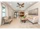 Spacious community room with comfortable seating and a kitchenette at 11945 Lovegrass St, Venice, FL 34293