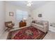 Home office with a desk, computer, and ample shelving for storage at 11945 Lovegrass St, Venice, FL 34293