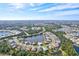 Expansive aerial showcasing a large, tranquil lake community at 12460 Davie Ct, Venice, FL 34293