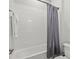 Bathroom with a bathtub and shower at 12460 Davie Ct, Venice, FL 34293