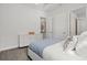 Bedroom with a full-size bed and modern dresser at 12460 Davie Ct, Venice, FL 34293