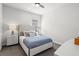 Bedroom with a full-size bed and neutral decor at 12460 Davie Ct, Venice, FL 34293