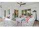 Relaxing outdoor patio with seating area, perfect for entertaining at 12460 Davie Ct, Venice, FL 34293