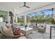 Relaxing outdoor patio with pool and seating area at 12460 Davie Ct, Venice, FL 34293