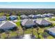 Aerial view of houses and a lake at 12488 Palatka Dr, Venice, FL 34293
