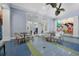 Community room with tables and chairs at 12488 Palatka Dr, Venice, FL 34293