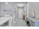 Bright and airy entryway with light gray walls and tile flooring at 12488 Palatka Dr, Venice, FL 34293