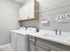 Laundry room with washer, dryer, and utility sink at 12488 Palatka Dr, Venice, FL 34293