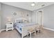 Spacious main bedroom with king-size bed and calming decor at 12488 Palatka Dr, Venice, FL 34293