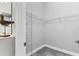 Well-organized walk-in closet with wire shelving at 12488 Palatka Dr, Venice, FL 34293