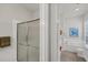 Bathroom with shower, tub, and double vanity at 13240 Guyana St, Venice, FL 34293