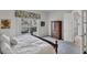 Guest bedroom with queen-size bed and sliding doors leading to a private patio at 13240 Guyana St, Venice, FL 34293
