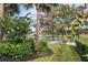 Landscaped area with pond, bridge and lush greenery at 13240 Guyana St, Venice, FL 34293