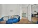 Cozy office space with a blue couch and built-in shelving at 13240 Guyana St, Venice, FL 34293