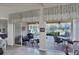 Relaxing screened patio with seating area overlooking the golf course at 13240 Guyana St, Venice, FL 34293